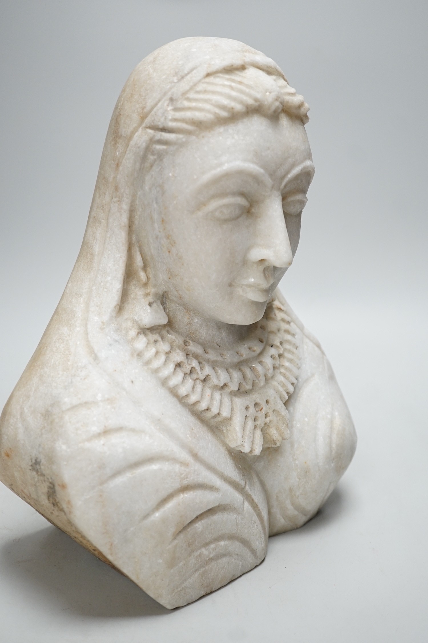 An Indian carved marble bust, 31cm